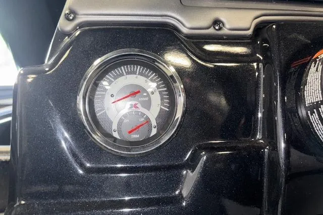 Slide: The Image of Dashboard gauge of 2026 Xpress H20 Bass boat, showing RPM and speed indicators. - 19