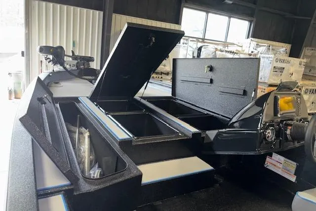 Slide: The Image of 2026 Xpress H20 Bass boat interior with open storage compartments. - 33