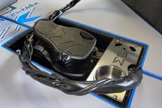 Slide: The Image of 2026 Xpress H20 Bass boat pedal and control panel, featuring sleek design and wiring. - 38