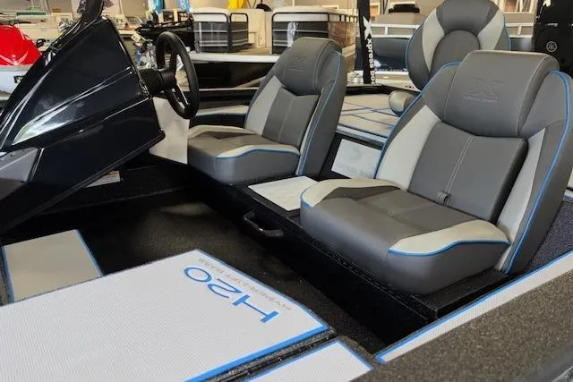 Slide: The Image of 2026 Xpress H20 Bass boat interior with sleek seating and modern design. - 4