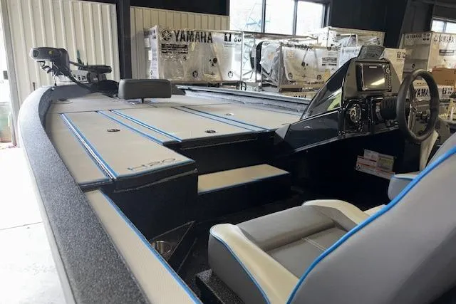 Slide: The Image of 2026 Xpress H20 Bass boat interior with modern seating and control panel. - 5