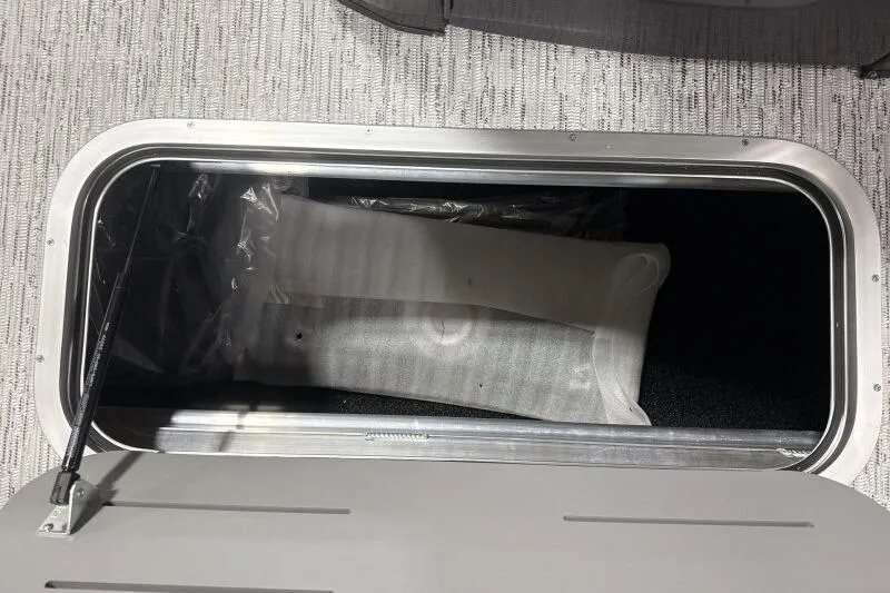 Slide: The Image of Storage compartment in 2026 Bennington 24 MFBSF boat, featuring a sleek design and ample space. - 15