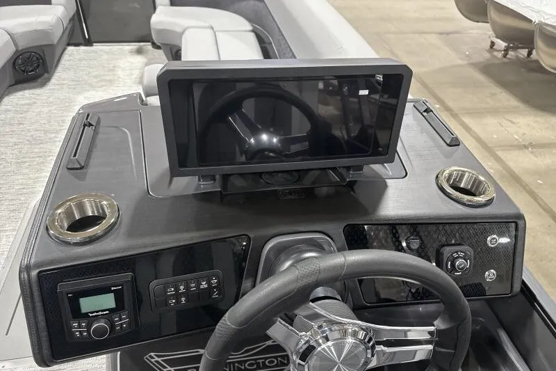 Slide: The Image of Dashboard of 2026 Bennington 24 MFBSF boat with steering wheel and touchscreen display. - 20