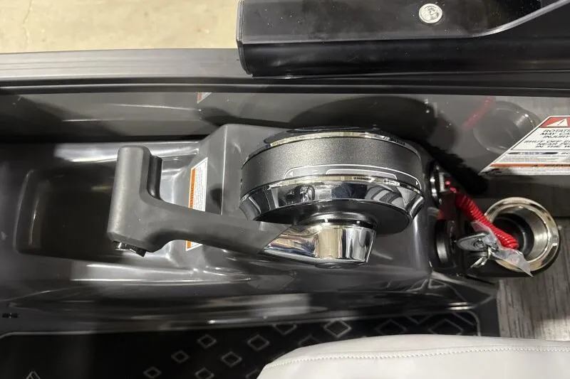 Slide: The Image of Control panel of a 2026 Bennington 24 MFBSF boat with throttle lever. - 21