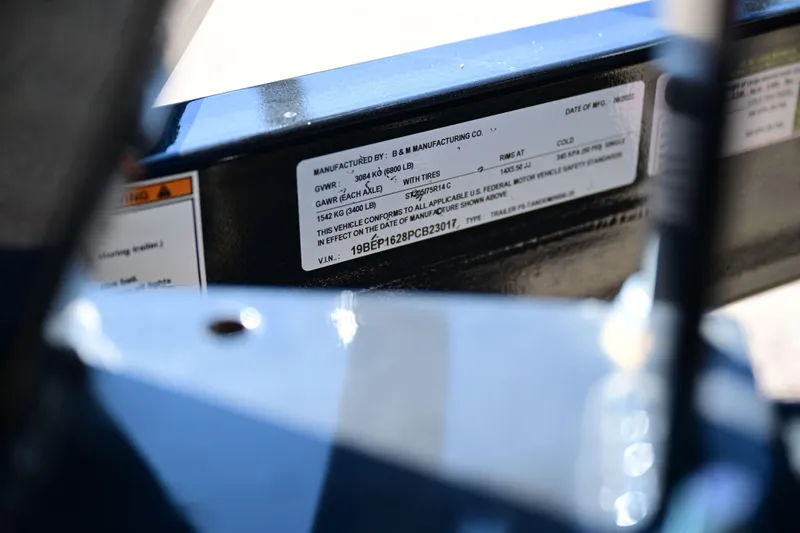 Slide: The Image of Close-up of a 2023 Aloha Pontoon Mahalo 23 vehicle identification label. - 10