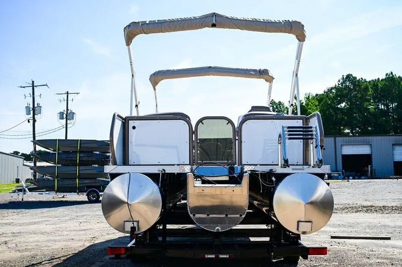 Slide: The Image of 2023 Aloha Pontoon Mahalo 23 boat, rear view, parked outdoors with canopy. - 3