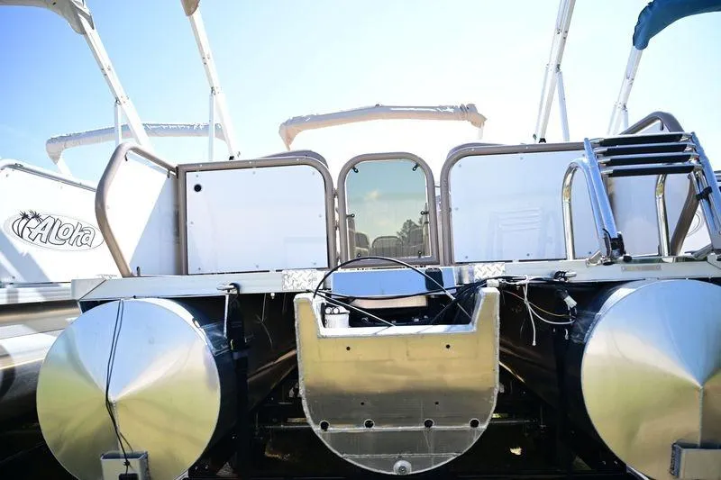 Slide: The Image of 2023 Aloha Pontoon Mahalo 23 boat rear view with aluminum pontoons and ladder. - 4