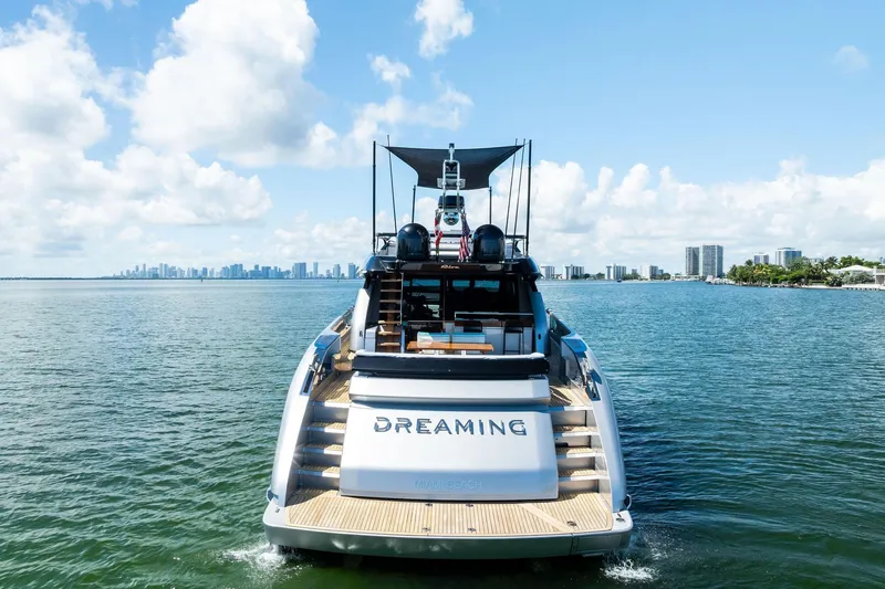 Slide: The Image of Luxury yacht Riva 76 PERSEO Super 2023 on water with city skyline background. - 14