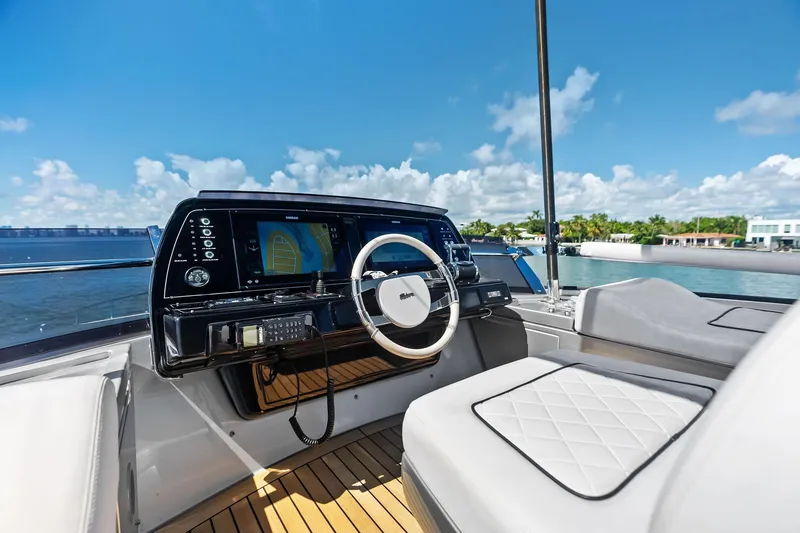Slide: The Image of Cockpit of 2023 Riva 76 PERSEO Super yacht with modern controls and ocean view. - 23