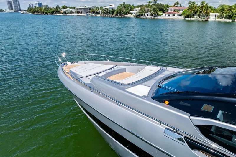 Slide: The Image of Luxury 2023 Riva 76 PERSEO Super yacht cruising on serene waters. - 27