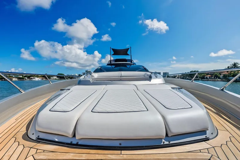 Slide: The Image of Luxurious 2023 Riva 76 PERSEO Super yacht deck under clear blue sky. - 30