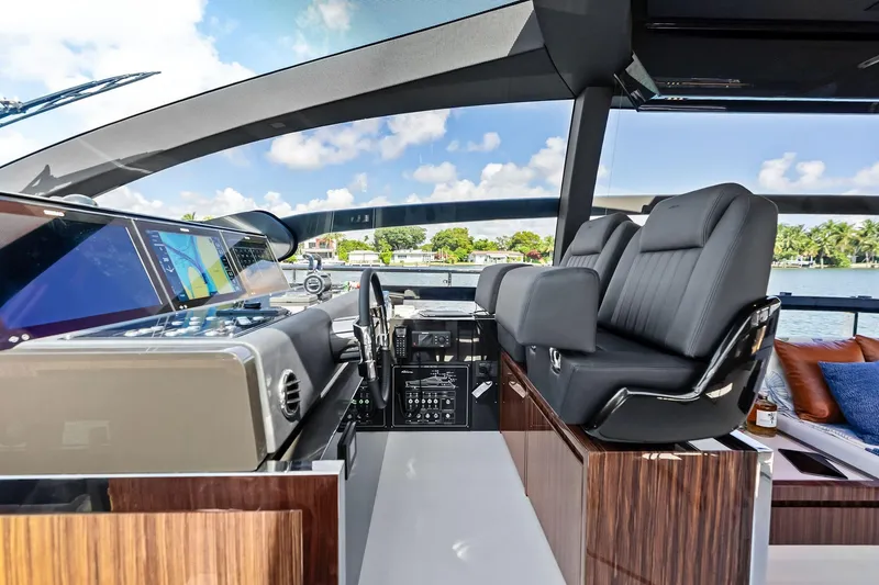 Slide: The Image of Luxurious interior of 2023 Riva 76 PERSEO Super yacht with modern helm and plush seating. - 48