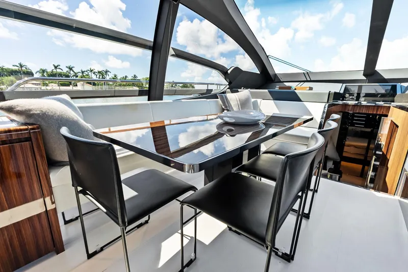 Slide: The Image of Luxurious interior of 2023 Riva 76 PERSEO Super yacht with sleek dining area. - 51