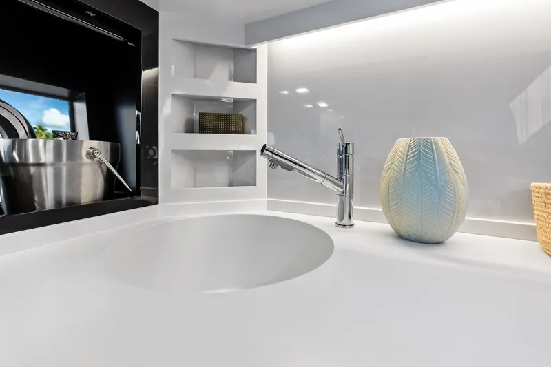 Slide: The Image of Luxury yacht Riva 76 PERSEO Super 2023 interior with modern sink and elegant decor. - 56