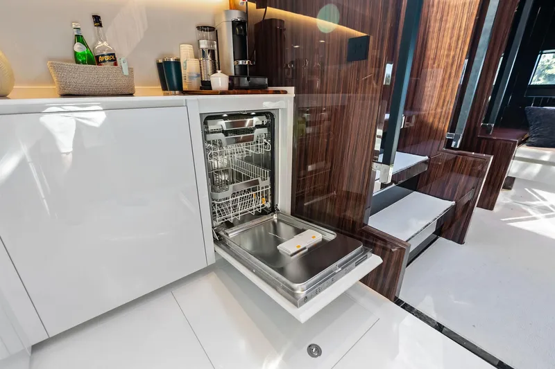 Slide: The Image of Luxurious interior of 2023 Riva 76 PERSEO Super yacht with open dishwasher. - 57