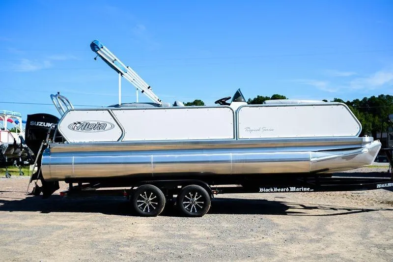The Image of 2023 Aloha Pontoon Mahalo 23 on trailer, side view, clear sky background. - 0