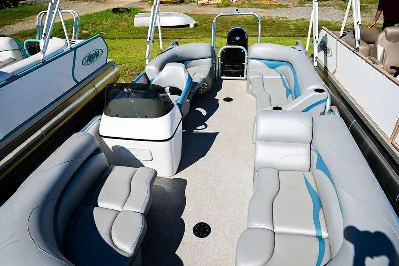 Slide: The Image of 2023 Aloha Pontoon Mahalo 23 boat interior with spacious seating and modern design. - 9