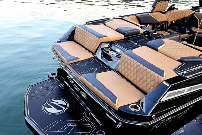 Slide: The Image of 2025 Tigé 22RZX boat with luxurious seating and sleek design on the water. - 15