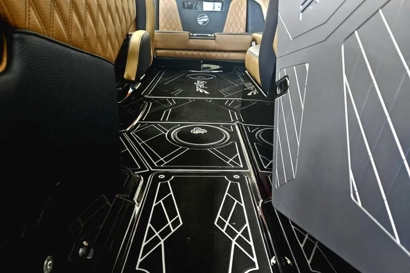 Slide: The Image of Luxurious interior of 2025 Tigé 22RZX boat with elegant seating and stylish flooring design. - 6