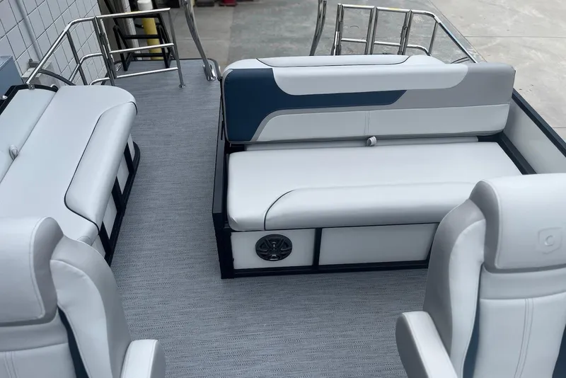 Slide: The Image of 2026 Godfrey SWEETWATER 2286 SFL pontoon boat interior with sleek white seating. - 18