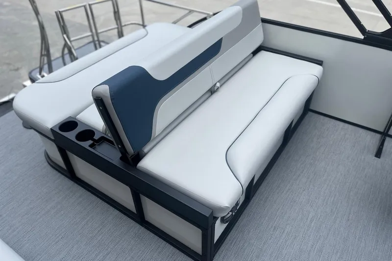 Slide: The Image of Luxury seating on 2026 Godfrey SWEETWATER 2286 SFL boat, featuring cup holders and modern design. - 19