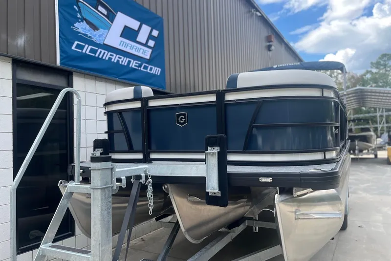 Slide: The Image of 2026 Godfrey SWEETWATER 2286 SFL pontoon boat on trailer at CIC Marine. - 4