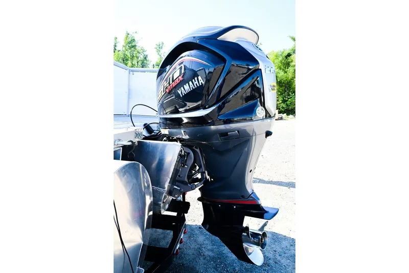 Slide: The Image of Yamaha outboard motor on 2023 Aloha Pontoon Mahalo 23, parked outdoors. - 5
