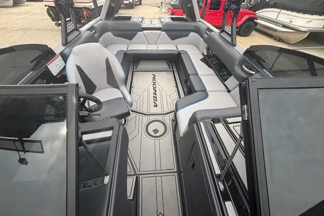 Slide: The Image of 2022 Moomba Kaiyen boat interior with sleek seating and modern design. - 31