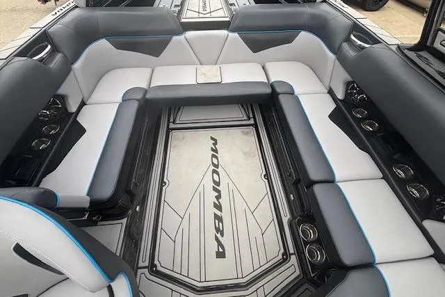 Slide: The Image of 2022 Moomba Kaiyen boat interior with spacious seating and modern design. - 34
