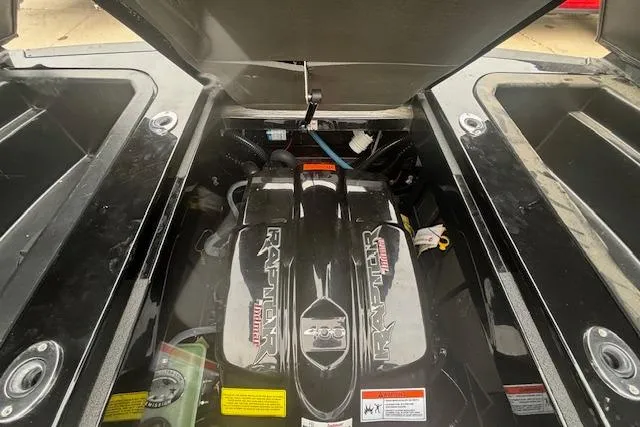 Slide: The Image of 2022 Moomba Kaiyen engine compartment showcasing powerful Raptor 400 engine. - 36