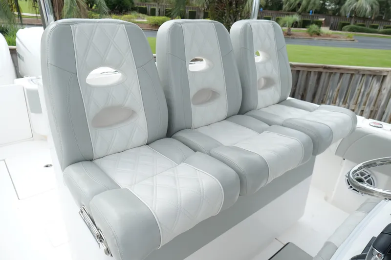 Slide: The Image of Luxurious seating on 2024 Contender 35 ST boat, featuring elegant diamond-stitched upholstery. - 16