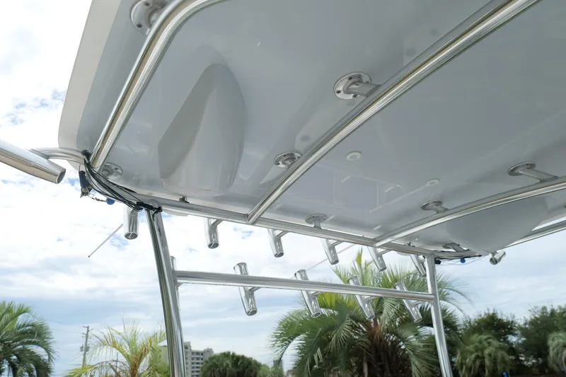 Slide: The Image of 2024 Contender 35 ST boat T-top with rod holders and stainless steel frame. - 22
