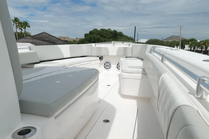 Slide: The Image of 2024 Contender 35 ST boat interior with white seating and sleek design. - 25