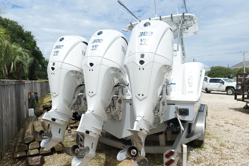 Slide: The Image of 2024 Contender 35 ST boat with triple Yamaha 300 V6 outboard engines. - 4