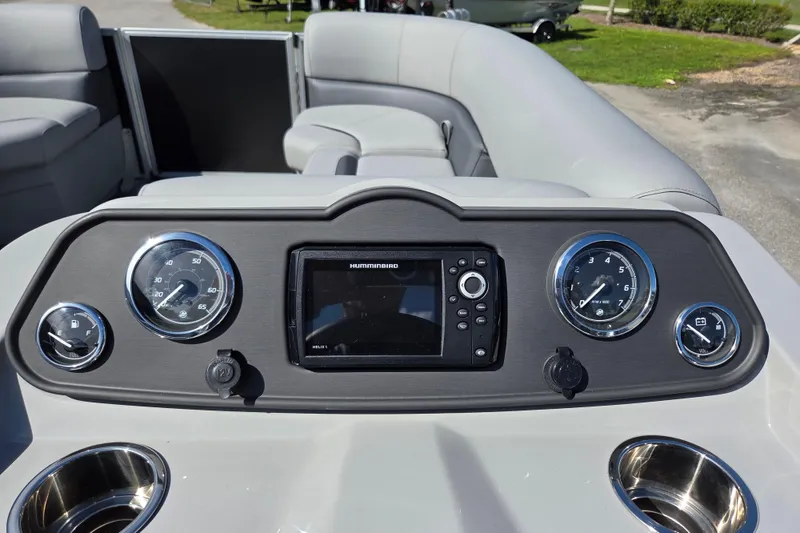 Slide: The Image of Dashboard of 2026 Bentley Pontoons LE 180 Cruise with gauges and navigation system. - 10