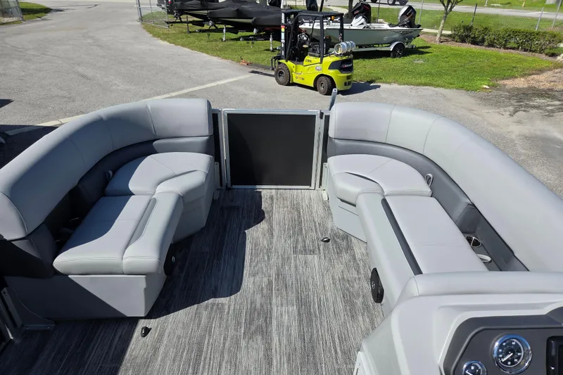Slide: The Image of 2026 Bentley Pontoons LE 180 Cruise interior with gray seating and modern design. - 15