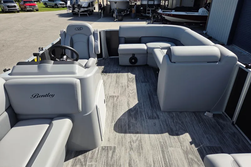 Slide: The Image of 2026 Bentley Pontoons LE 180 Cruise interior with luxurious seating and modern design. - 9
