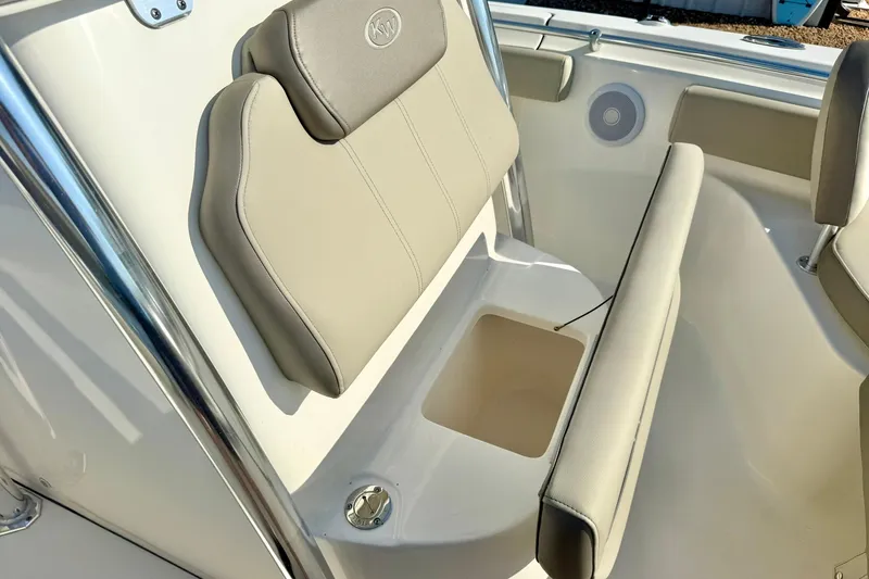 Slide: The Image of 2022 Key West 219 FS boat seat with storage compartment and speaker. - 21