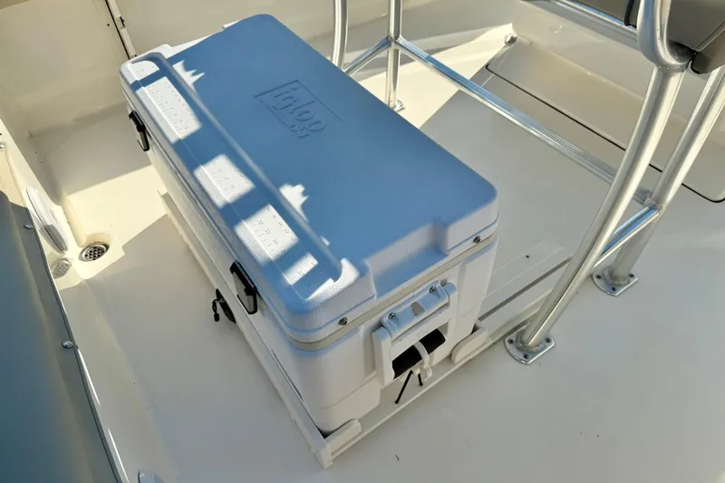 Slide: The Image of Cooler on 2022 Key West 219 FS boat deck, secured with metal frame. - 34