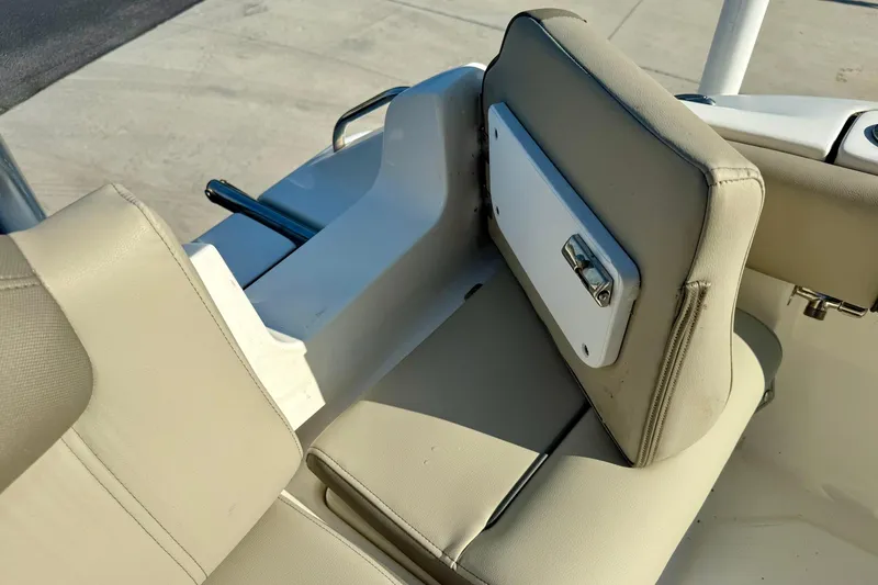 Slide: The Image of 2022 Key West 219 FS boat seat with storage compartment, beige upholstery. - 43