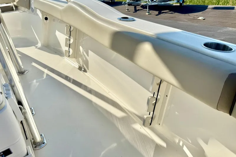 Slide: The Image of 2022 Key West 219 FS boat interior with cup holders and seating. - 45