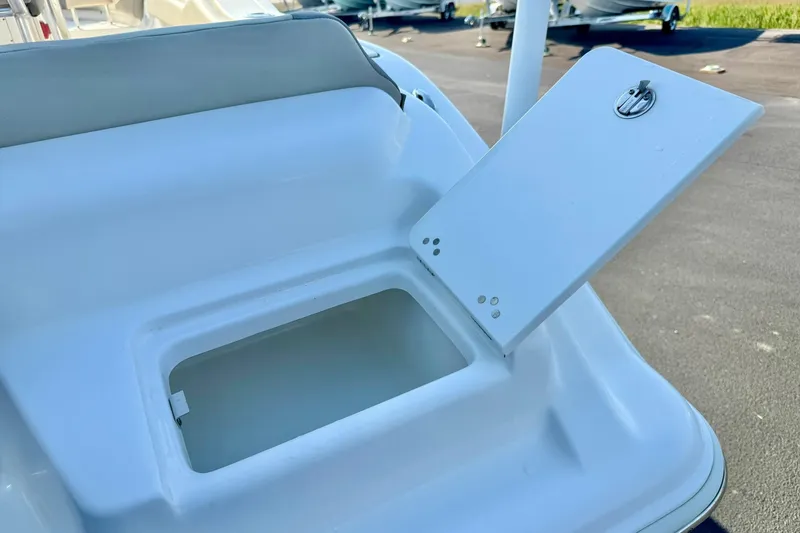 Slide: The Image of Open storage compartment on 2022 Key West 219 FS boat, showcasing interior space. - 47