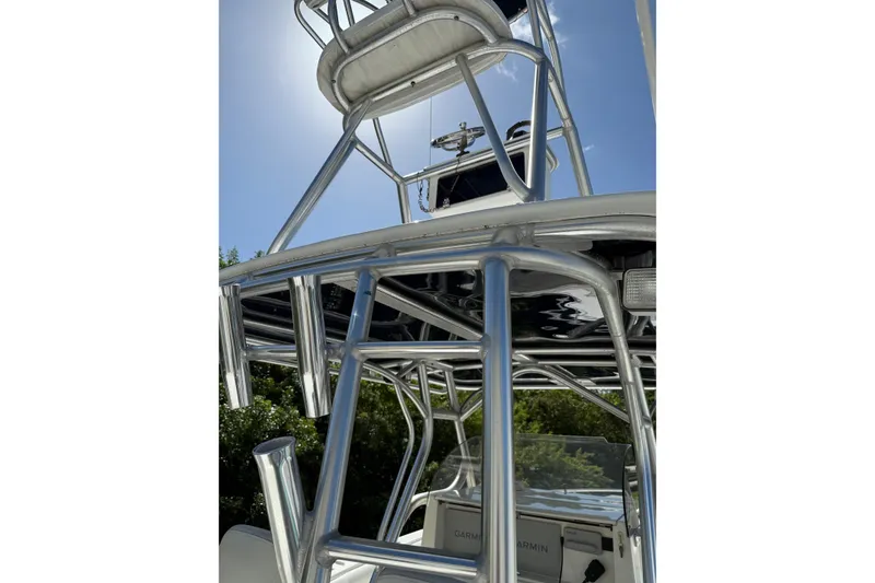 Slide: The Image of 2001 Marlago 35 Cuddy boat tower with clear sky background. - 10
