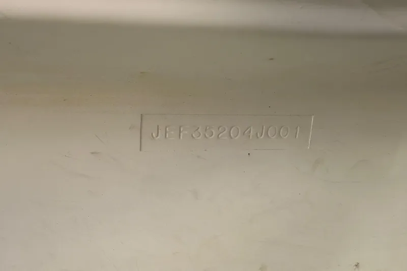 Slide: The Image of Hull identification number on 2001 Marlago 35 Cuddy boat. - 35