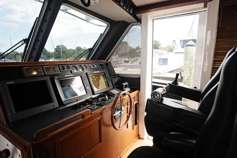 Slide: The Image of Pilot Cruiser Expedition 2007 yacht cockpit with navigation equipment and captain's chair. - 20