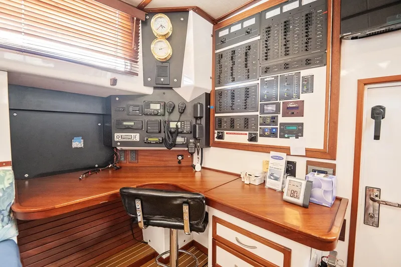 Slide: The Image of Control room of a 2007 Pilot Cruiser Expedition yacht with navigation and communication equipment. - 33