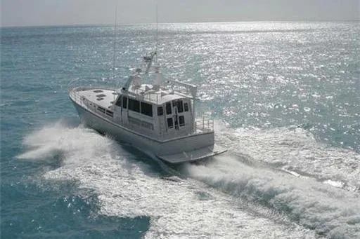Slide: The Image of 2007 Pilot Cruiser Expedition navigating through sparkling ocean waters. - 5