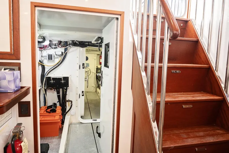 Slide: The Image of Interior of 2007 Pilot Cruiser Expedition, featuring stairs and technical equipment room. - 57