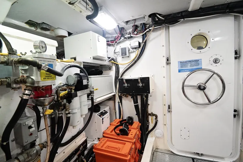 Slide: The Image of Engine room of 2007 Pilot Cruiser Expedition with control panels and equipment. - 60