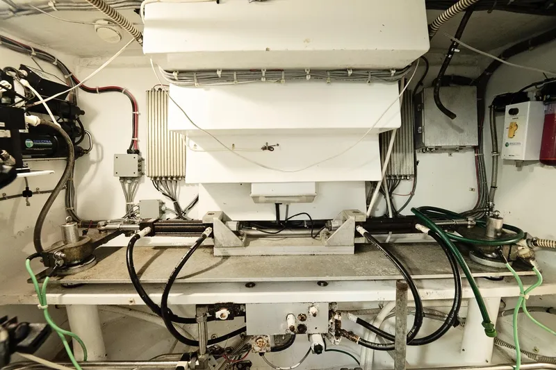 Slide: The Image of Engine room of 2007 Pilot Cruiser Expedition with complex machinery and wiring. - 63